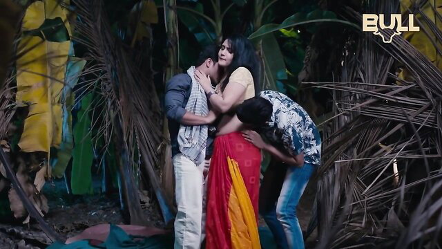 Indian MILF in steamy threesome with two men in jungle