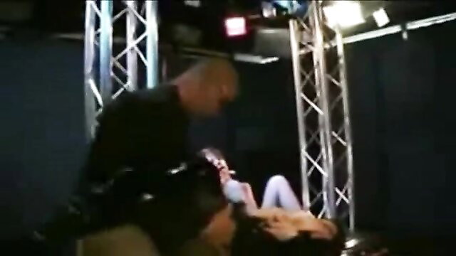 Bald man in leather pounds naughty Swedish MILF hard on stage