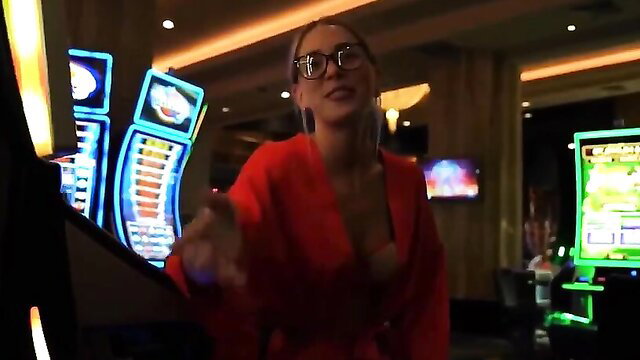 Dan Damage sexy MILF in red blazer at casino smiling seductively