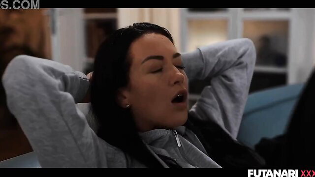 Hot brunette futanari babe in hoodie moaning in ecstasy closeup