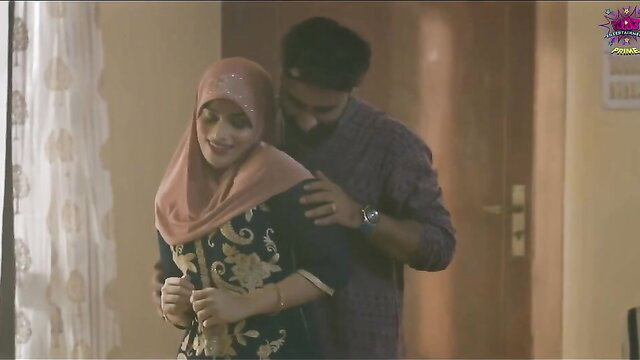 Hot hijab brunette hugged by man in steamy Hindi couple scene