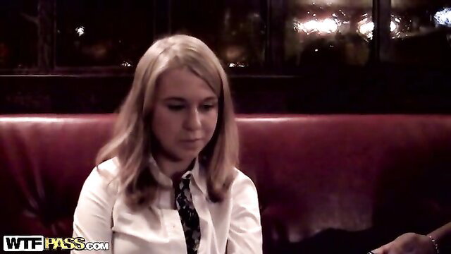 Naughty blonde teen in white shirt and tie on red booth