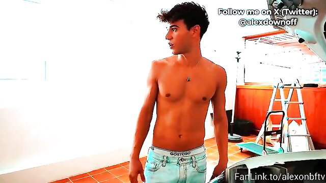 Hot curly-haired Latino twink shirtless in tight jeans by car