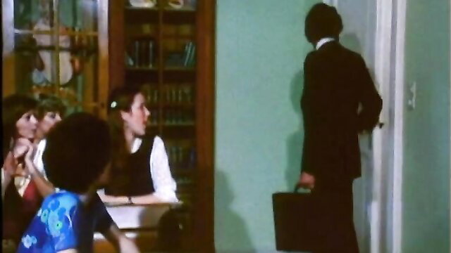 Kinky teens in classroom tease suited guy with briefcase