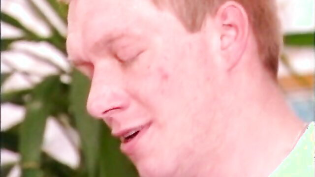 Closeup of pale redhead teen with freckles smiling in lesbian XXX thumbnail