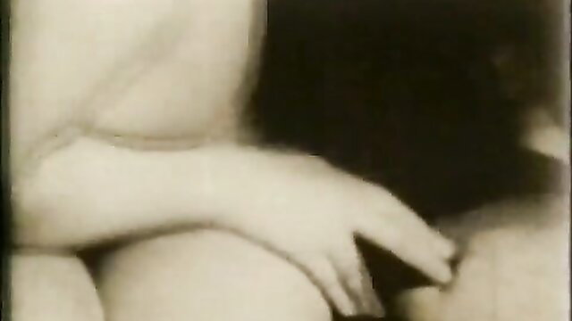 Linda Roberts pale arm hand gripping crotch in vintage erotic pose