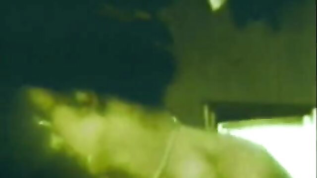 Vintage erotic closeup of young black-haired woman in bra and panties