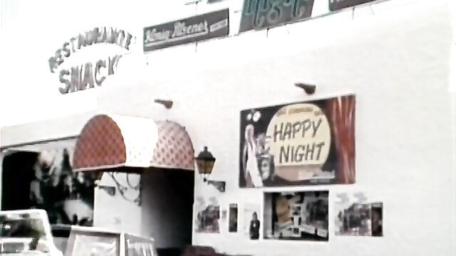 Classic Snacky Restaurant exterior with Happy Night sign, retro adult vibe