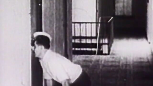Vintage 40s sailor man peeking around corner in classic porn clip