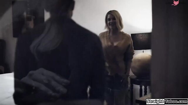 Kit Mercer blonde stepmom in tight top smiles at stepson in intimate bedroom