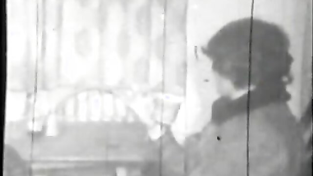 Retro 8mm CFNM tease: brunette whore at hotel window, vintage porn loop