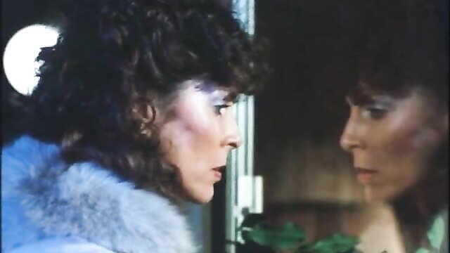 Vintage babe with natural tits in fur coat and bra gazing in mirror