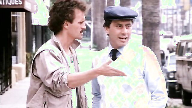 Vintage 80s gay porn thumbnail: hairy men chatting on street