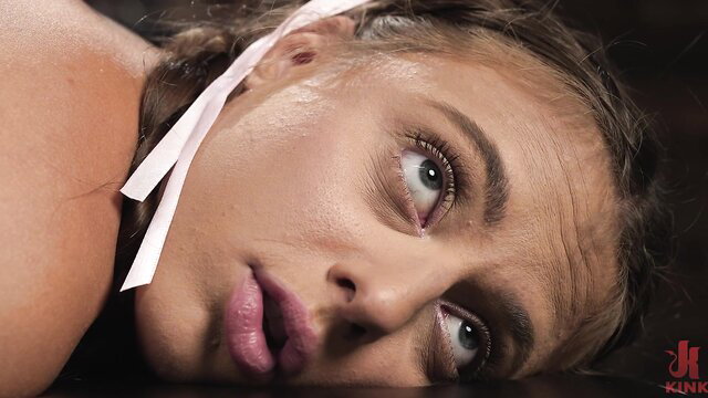 Gia Derza tied up gagged with pink ribbon like a slave