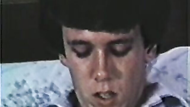 Closeup of man eating hairy pussy in Erica's retro porn