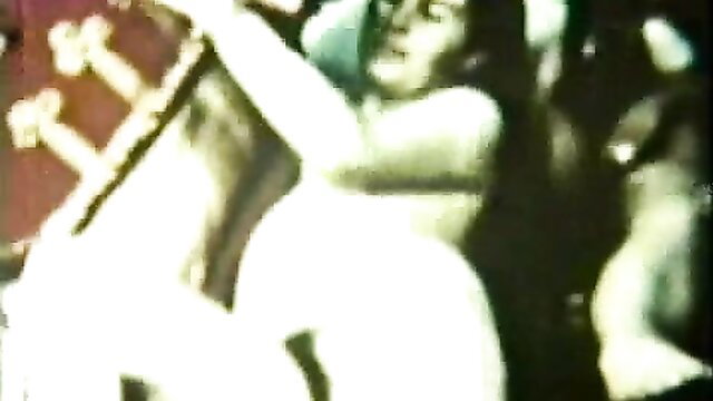 Vintage Linda Roberts nude with dildo, legs spread wide