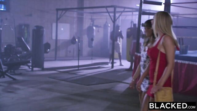 Riley Reid and Gabbie Carter in gym with Blacked.com