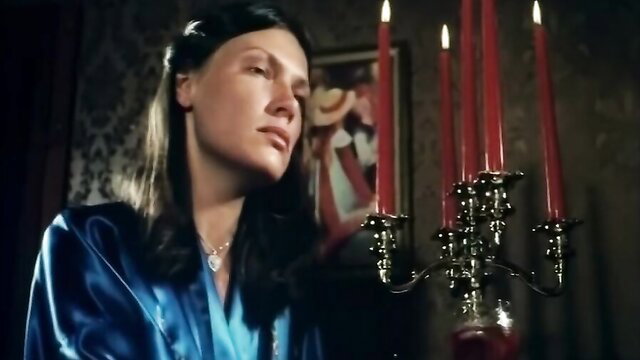 Retro brunette in silk robe, candlelit hairy legs edging scene