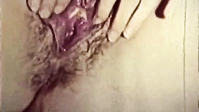 Curvy babe's wet pussy spread wide by hand in classic XXX closeup