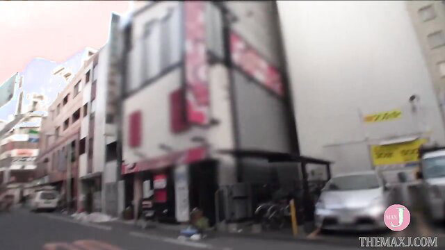 Japanese babe in pink lingerie on urban street, GRAPHIS JAV tease