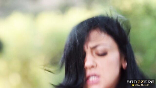 Audrey Bitoni messy black hair closeup in outdoor Brazzers scene