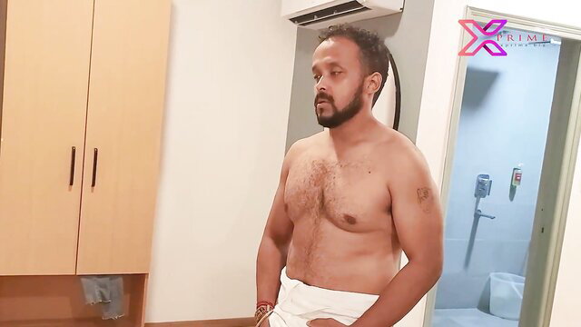 Nude Indian man in dhoti sits hairy chest exposed in desi amateur video
