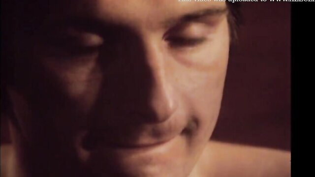 Closeup of hot Swedish babe Molly's smiling face in retro sex tape