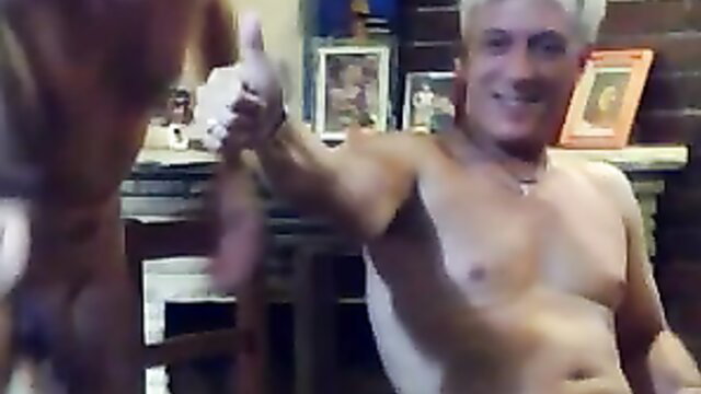 Muscular mature white swinger man thumbs up shirtless on webcam