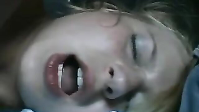 Busty blonde babe with open mouth after messy facial cumshot