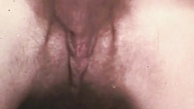 Closeup of hairy mature pussy spread wide open in hardcore classic XXX