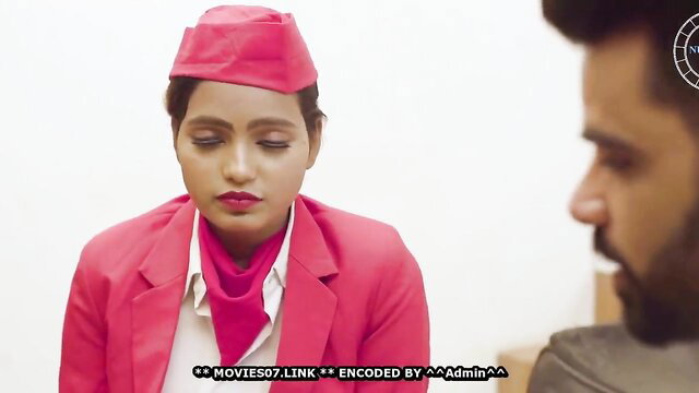 Hot Indian air hostess in pink uniform closeup face tease