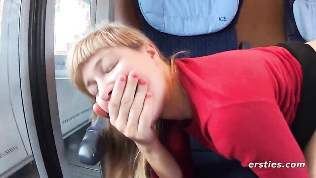 Blonde Russian babe stifling moans on public train seat