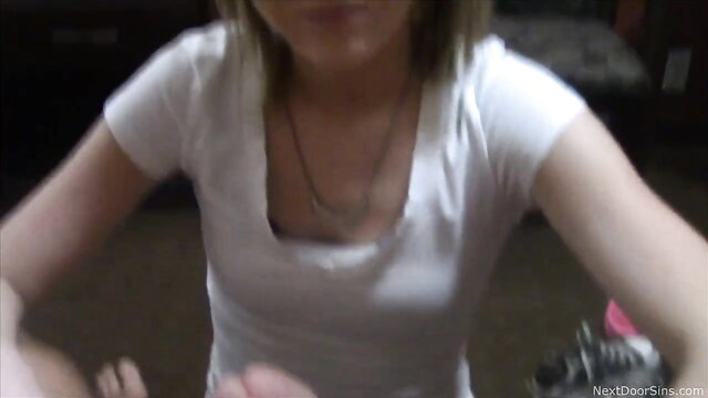 Hot teen in tight white tank top teases cleavage in naughty amateur video