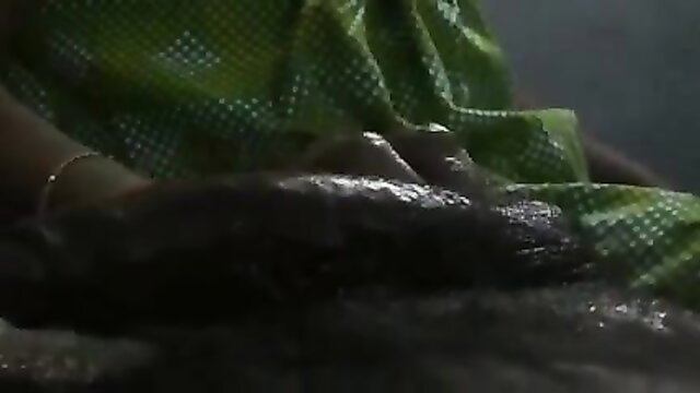 Indian aunty oily handjob on cock in green saree