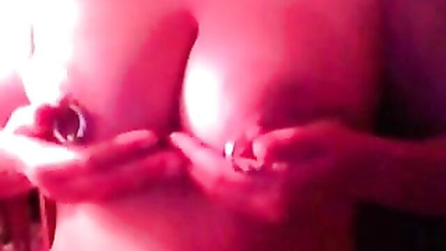 Amateur nympho shows off pierced nipples and massive knockers