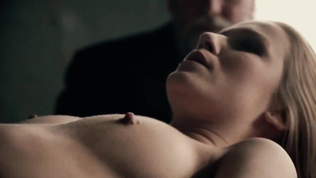 Blonde Alexis Crystal topless and exposed in hot prison threesome