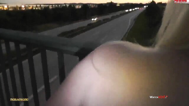 SteffiLuu blonde on knees by Autobahn bridge at dusk