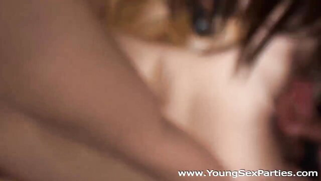 Blurry closeup of young woman's face in naughty romp soiree