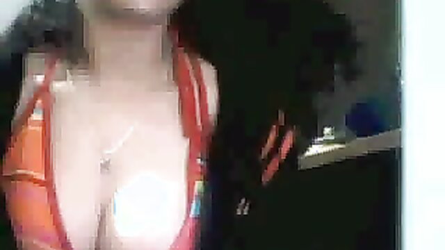 Arab cutie in red lingerie flaunts massive tits on webcam