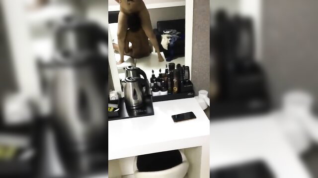 Hot Desi girl bent over, tight ass fingered in hotel mirror