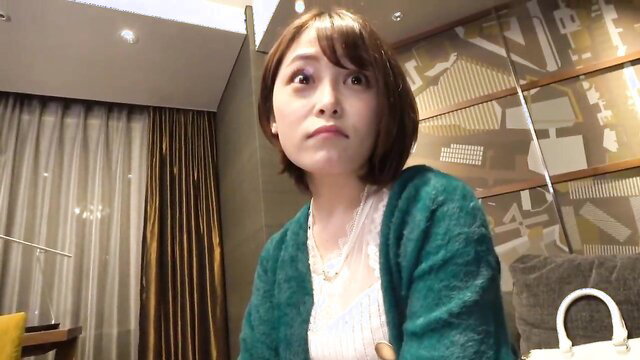 Japanese married prostitute G cup boobs in green sweater hotel room
