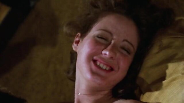 Hot retro blonde teen smiling with natural big tits lying nude