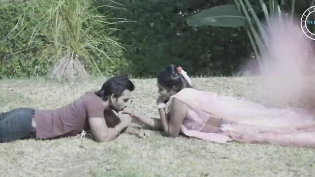 Indian couple in lingerie on grass, romantic outdoor pose from Ullu Reality Pornstars Part 02
