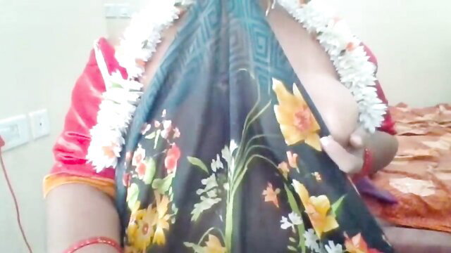 Indian aunty big boobs exposed in blue floral saree with garlands
