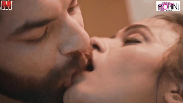 Desi cougar passionately French kisses bearded man in hot closeup