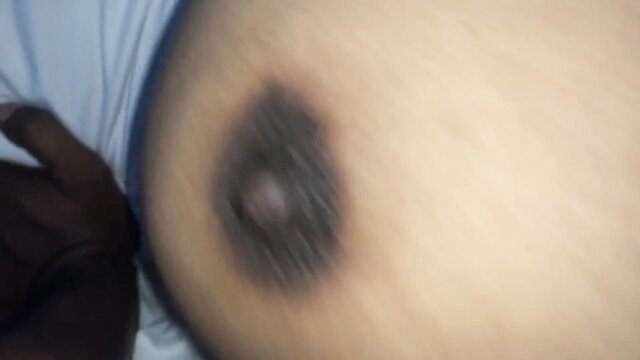 Closeup of Desi woman's dark hairy nipple and areola in porn thumbnail