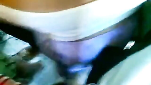 Blurry closeup of woman's big ass in purple panties at public bus stop