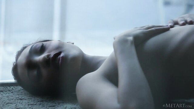 Sexy silhouette nude babe lying seductively, showing off curves