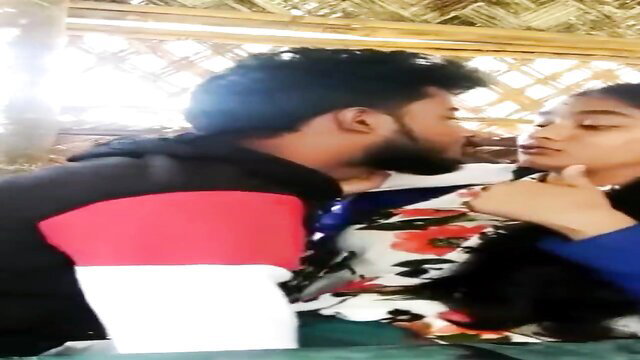Desi Indian couple passionately kissing in hut on voyeur cam
