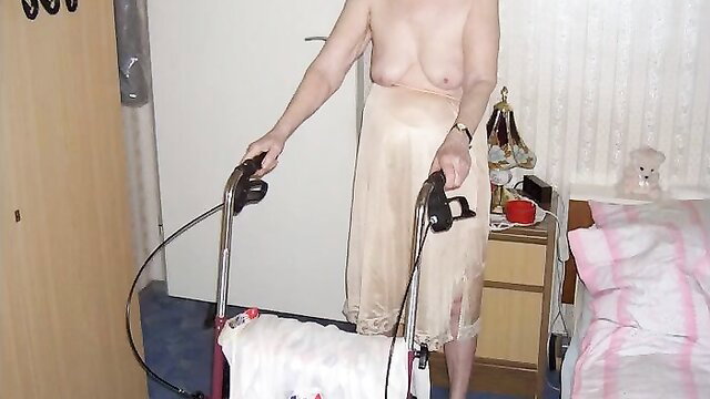 Elderly granny in sheer lingerie using walker nude tits exposed